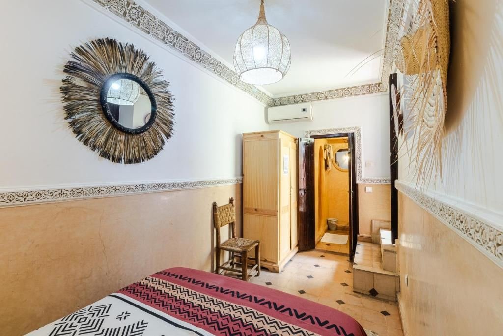 Double Room at Riad Davina, large bed, traditional Moroccan decor